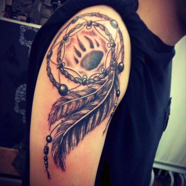 Dreamcatcher with bear paw in the wheel