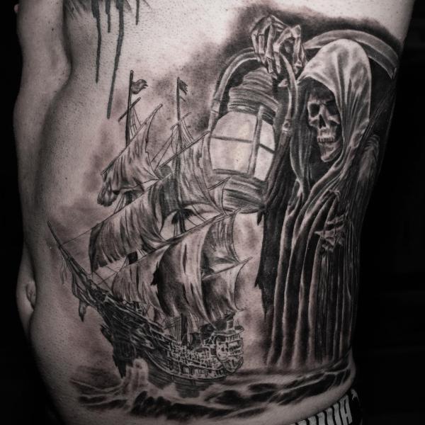 Grim Reaper holding a lamp for a sailing boat