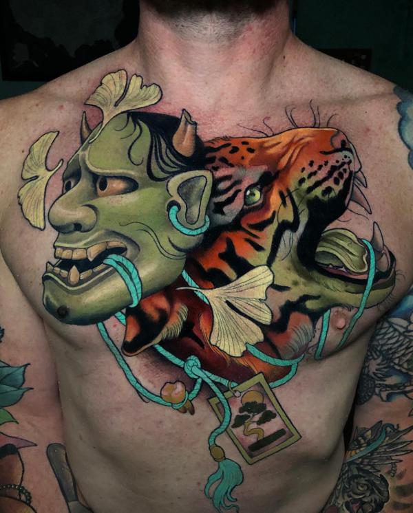 Hannya mask and tiger head with ginkgo biloba leaves