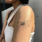 Heart shaped spider web in light ink
