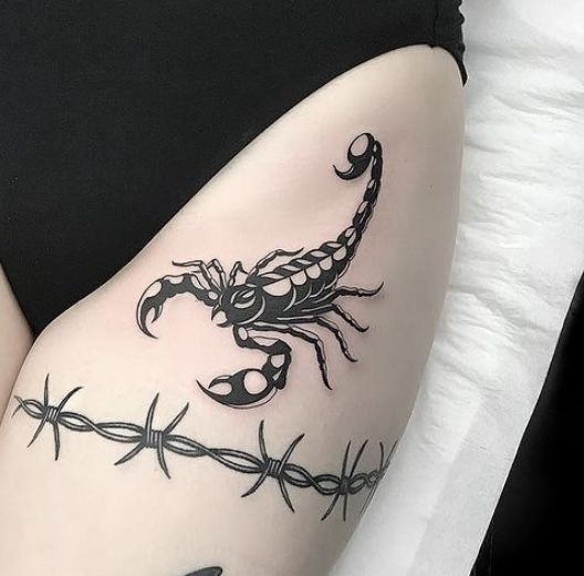Iron thorn and scorpion thigh tattoo