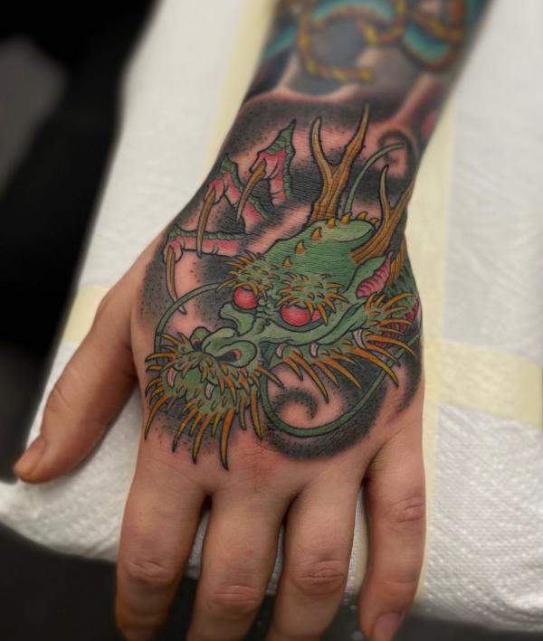 Japanese dragon hand tattoo