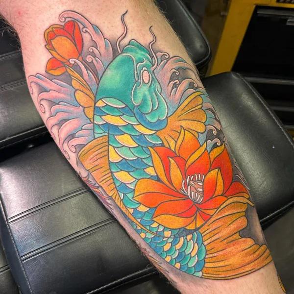 Japanese water lily and koi fish tattoo