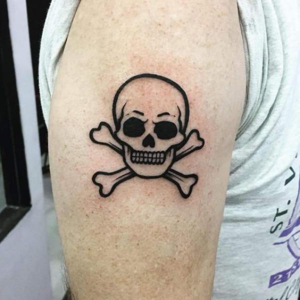 Jolly roger upper arm tattoo