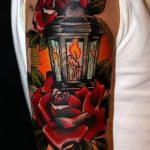 Lamp adorned with red roses