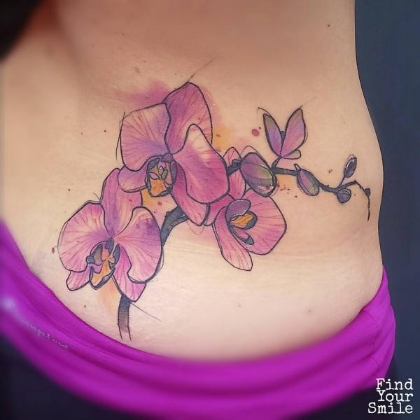 Orchid low back tattoo