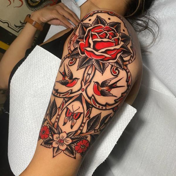 traditional rose tattoos sleeve