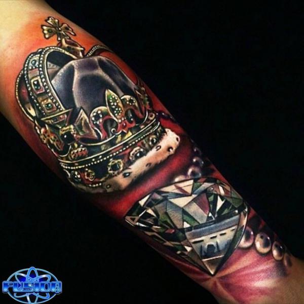 Realistic diamond and crown tattoo