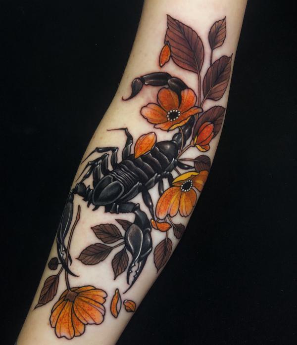 Realistic scorpion in the flowers