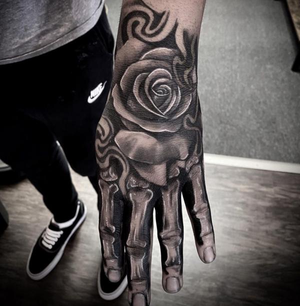 Tattoo uploaded by Pedro Amador  Rose  Bones hand tattoo by Pedro Amador  rose rosetattoo handtattoo blackandgrey blackandgreytattoo  Tattoodo