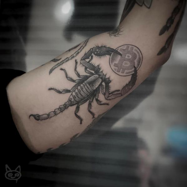 Scorpion holding a coin