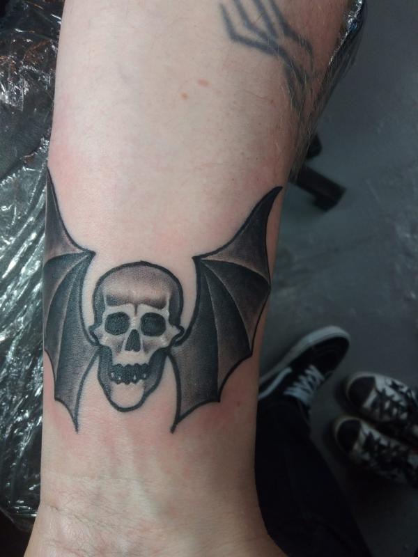 Skull with bat wings
