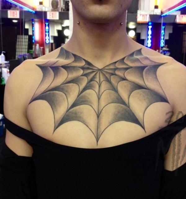 Spider web tattoo on chest for men