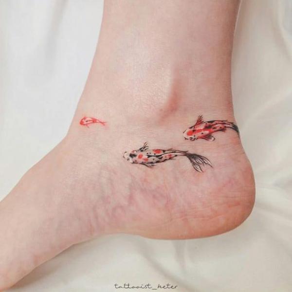 Koi Fish tattoo with a hint of red | TikTok