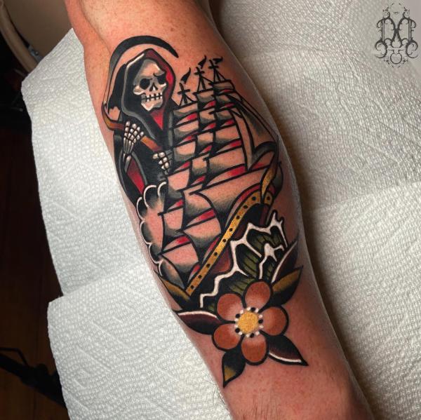Traditional grim reaper and boat tattoo