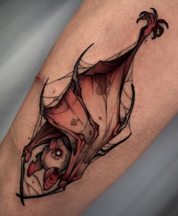 bat hanging upside down tattoo