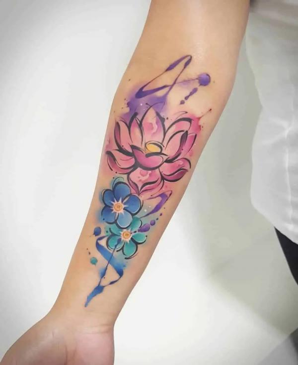 Watercolor water lily and violet tattoo