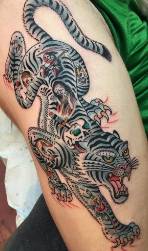 White tiger with death motifs portrayed on its body
