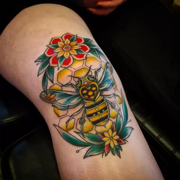 Bee tattoo on knee
