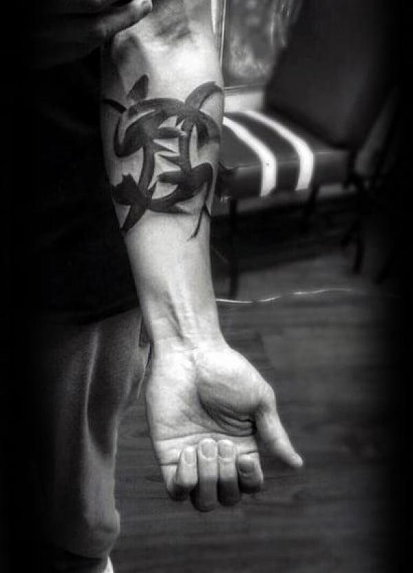 Black ink Pisces glyph tattoo for men