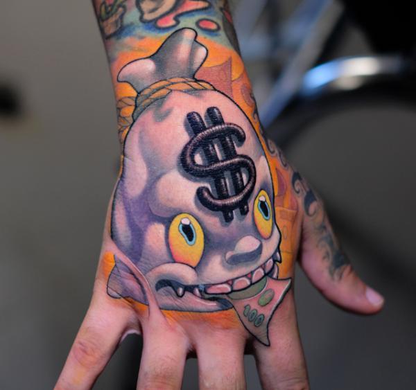 Cartoon money bag tattoo