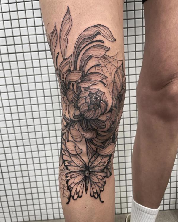 Chrysanthemum knee Tattoo with spider web