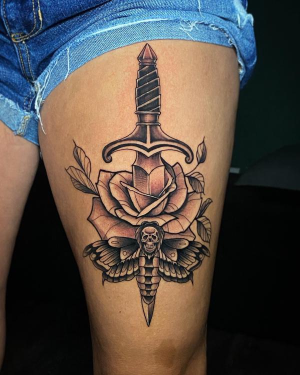 Dagger piercing through rose and death moth