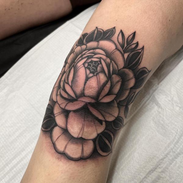 Dark rose tattoo