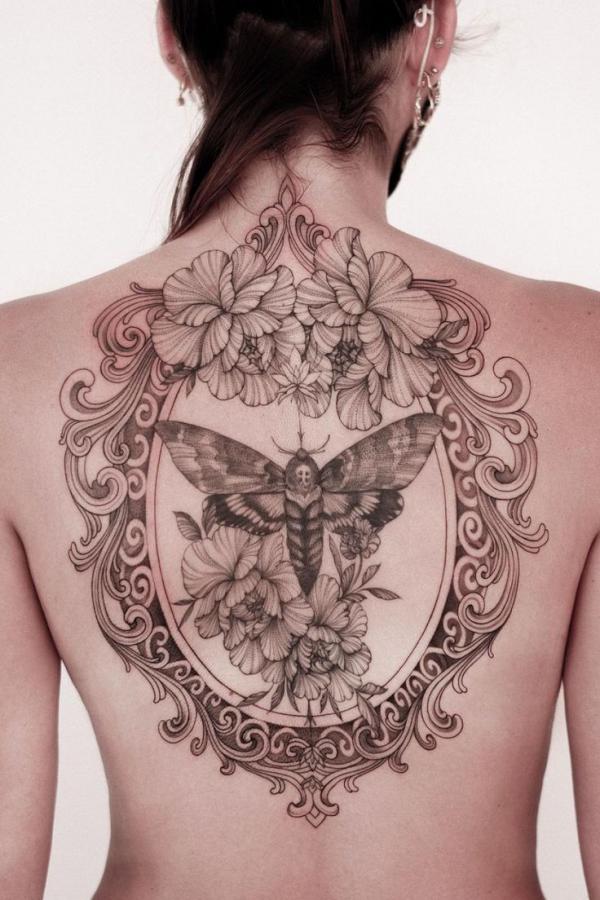 Death Moth and flowers frame tattoo