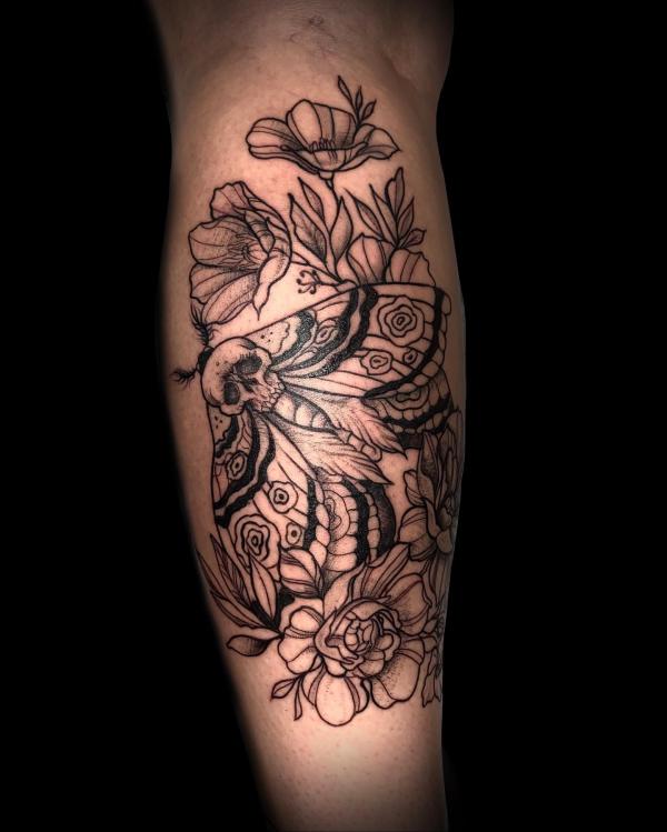 Death moth and flowers calf tattoo