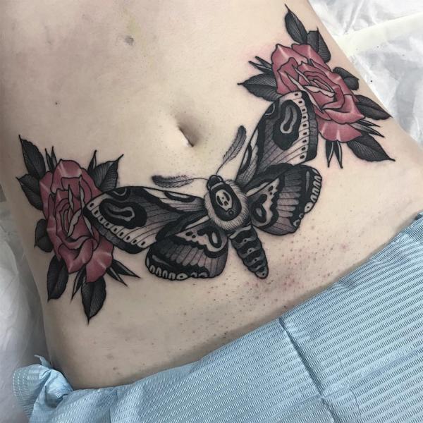 Death moth and rose belly tattoo