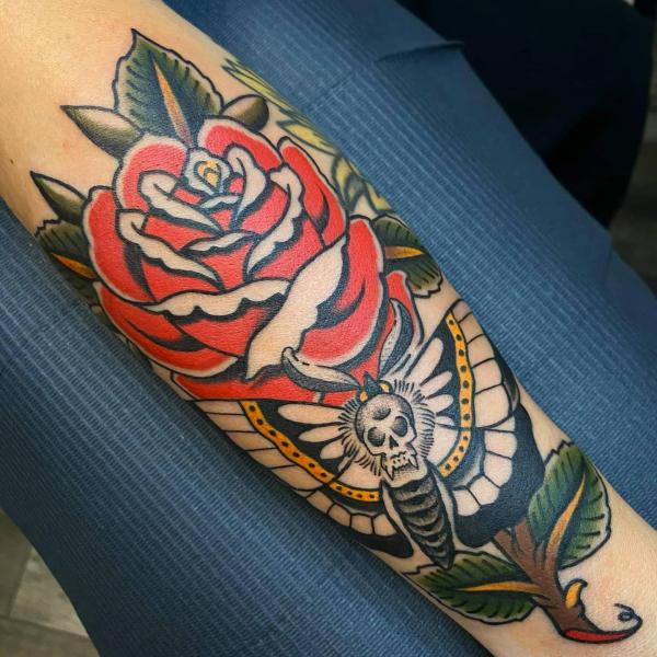 Death moth and rose tattoo