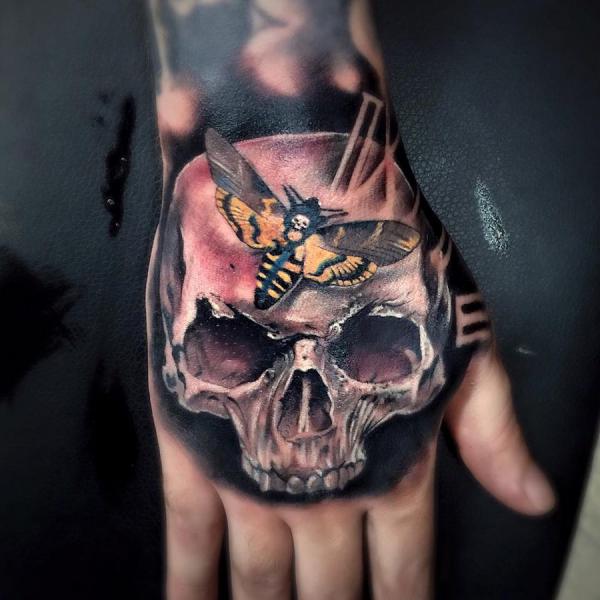 Deaths head Hawkmoth and skull hand tattoo
