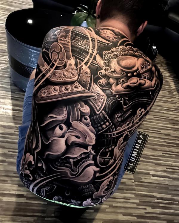 Japanese foo dog and samurai oni mask full back tattoo
