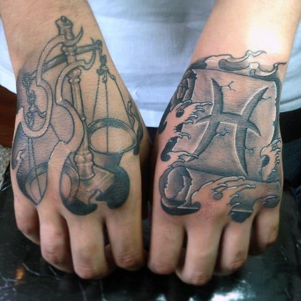 Libra and pisces zodiac symbol hand tattoo