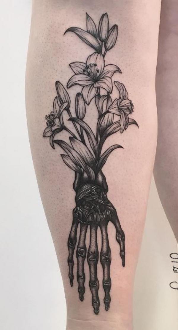 60 Skeleton Hand Tattoo Ideas with Meaning