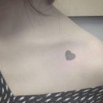 Minimalist fingerprint heart tattoo