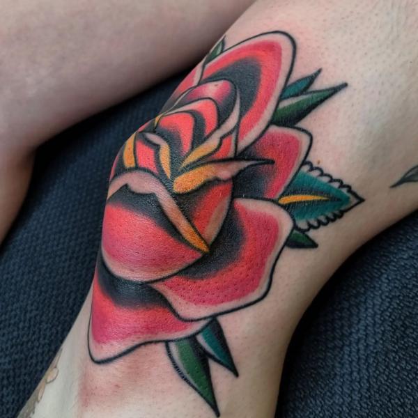 Old school rose knee tattoo