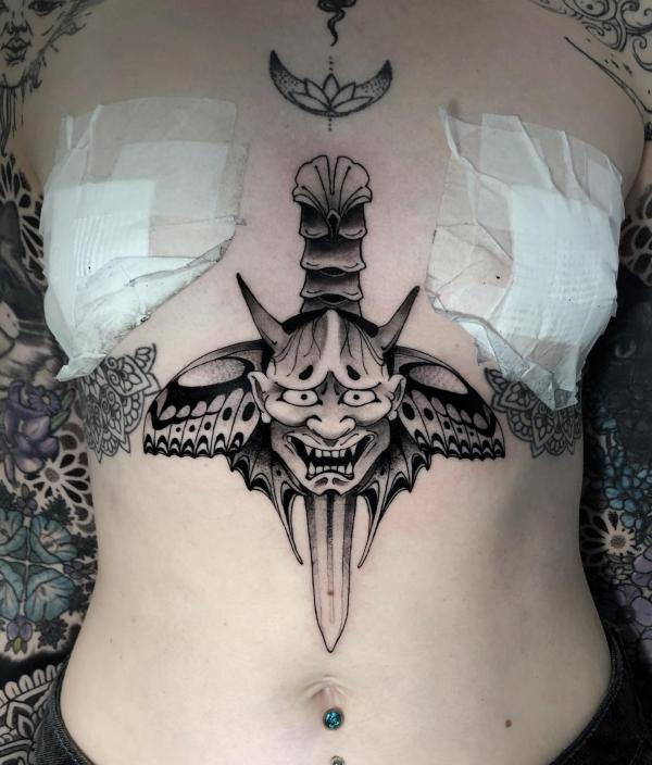 Oni with butterfly wing tattoo