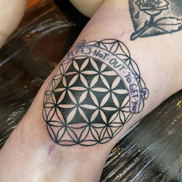 Seed of life knee tattoo