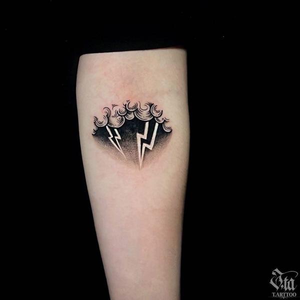 Small clouds and lightning bolt