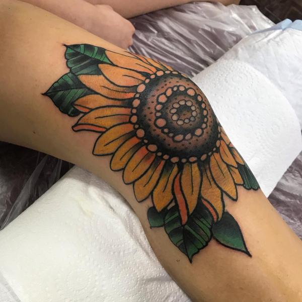 Sunflower knee tattoo