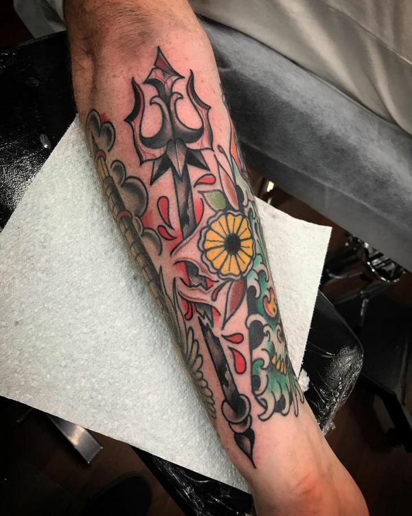 Traditional Trident and sunflower tattoo