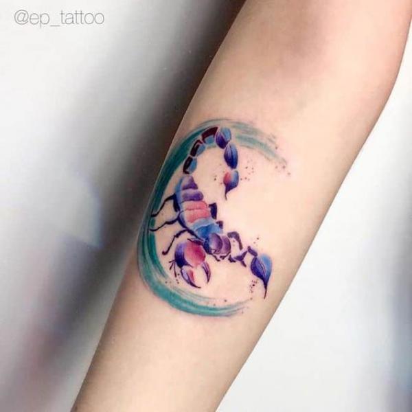 Watercolor scoprtion tattoo