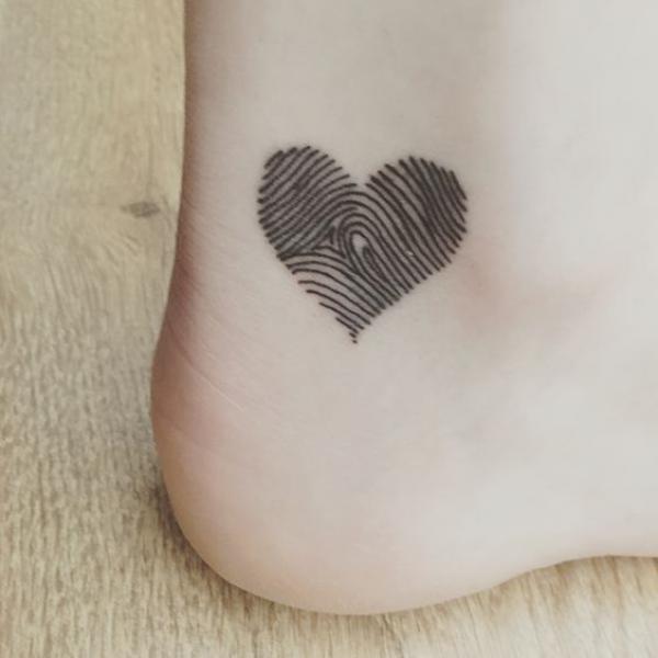 fingerprint heart ankle tattoo