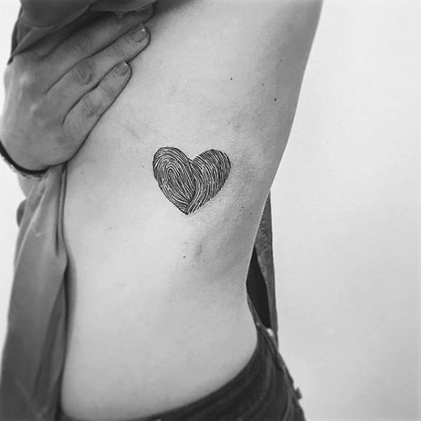 fingerprint heart side tattoo