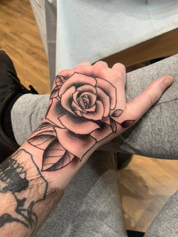50+ Rose Hand Tattoo Designs with Meanings Art and Design