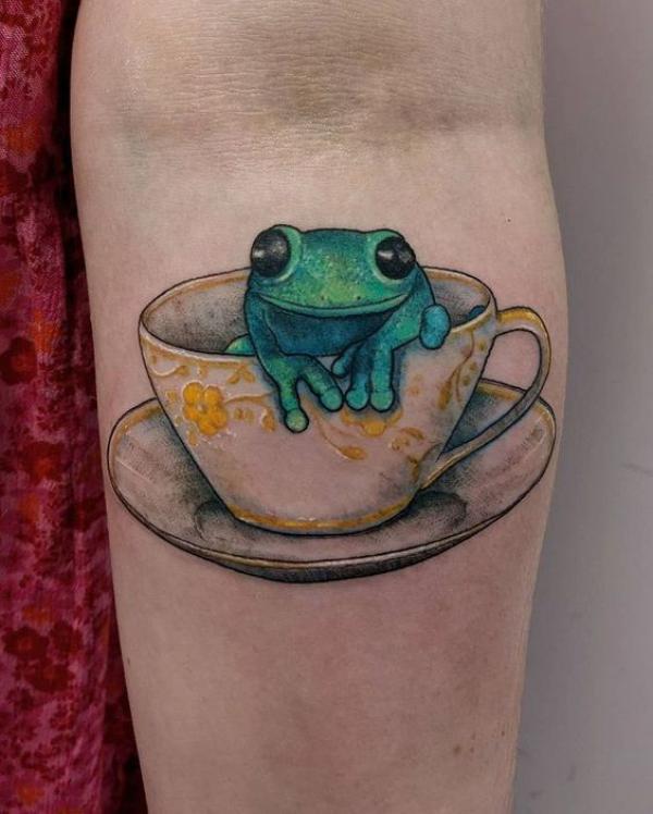 A frog in a cup