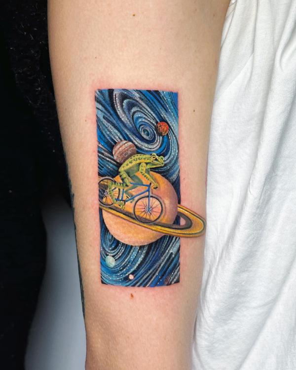 A frog riding a bicycle around planet