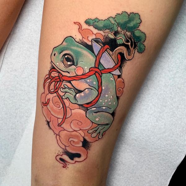 A frog with bonsai on clouds